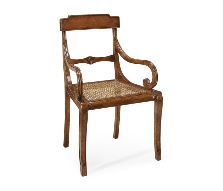 Regency walnut scroll armed chair with caned seat