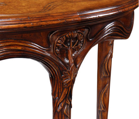 Walnut console with a leather top