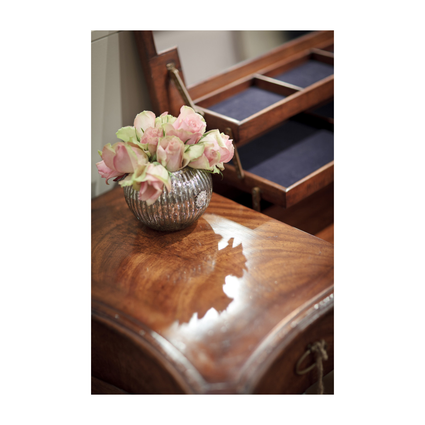 Dressing table with hinged mirror