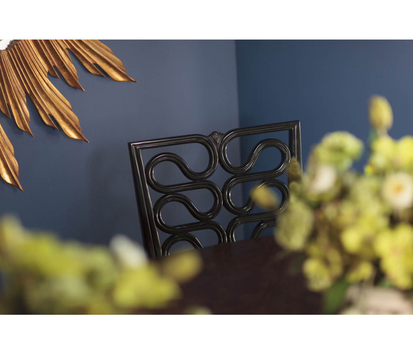 Large black sunburst mirror