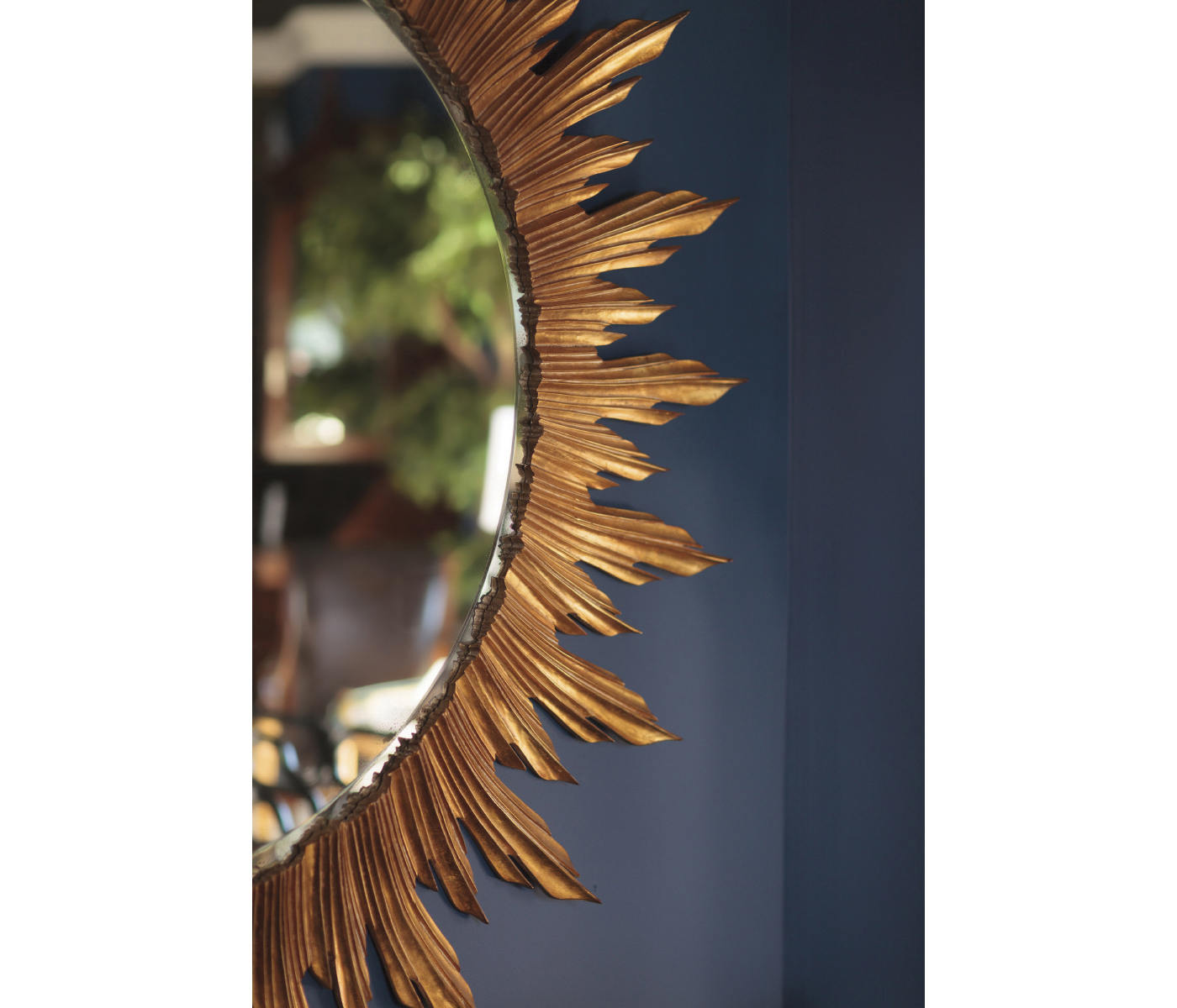 Large black sunburst mirror