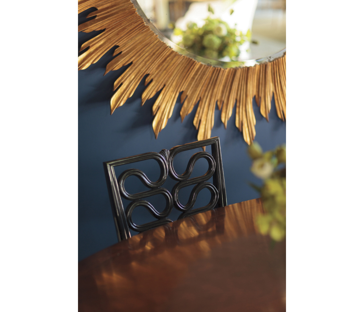 Large black sunburst mirror