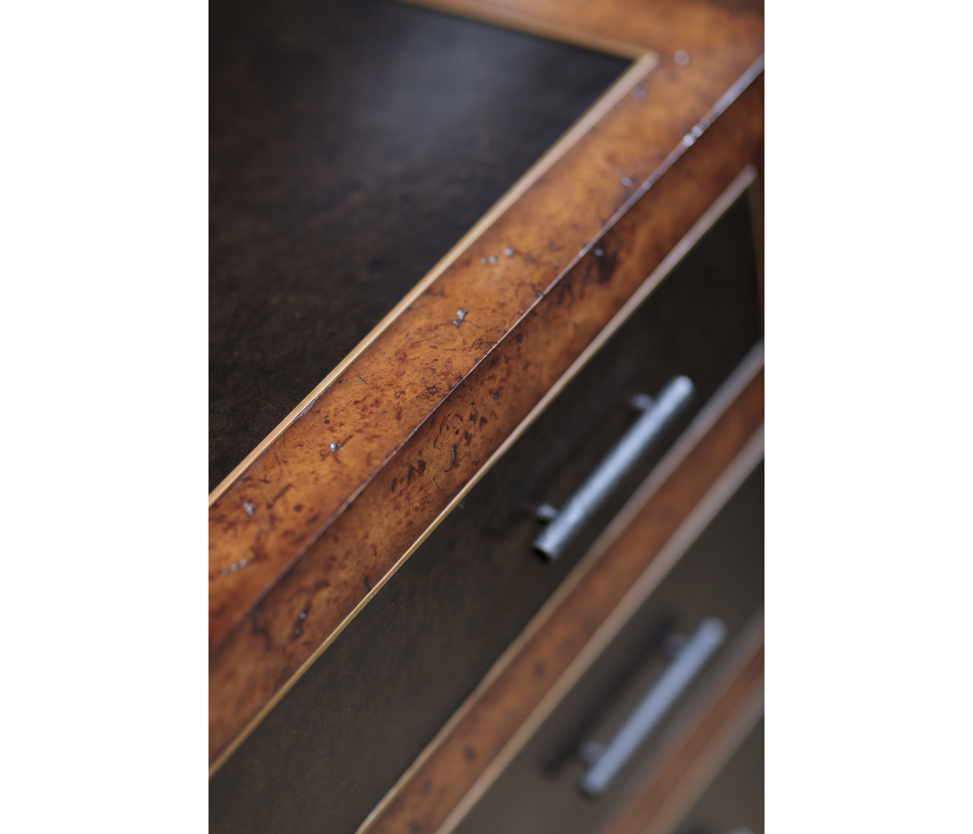 Rustic burl oak and leather chest of four drawers